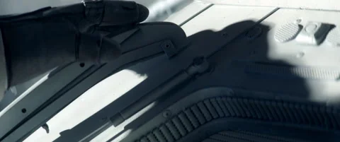 CU on hand - astronaut on a outer part of a space craft during spacewalk Stock Footage 179480655