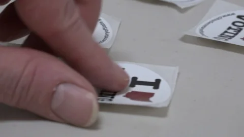 CU hand picks up Ohio voting stocker Stock-Footage 106158876