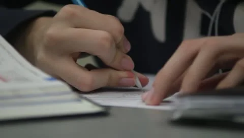 CU hand writing on paper Stock-Footage 10715581