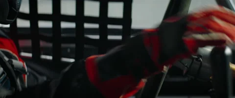 CU on hands and steering wheel, sports car driver in racing on a speedway Stock Footage 147114934