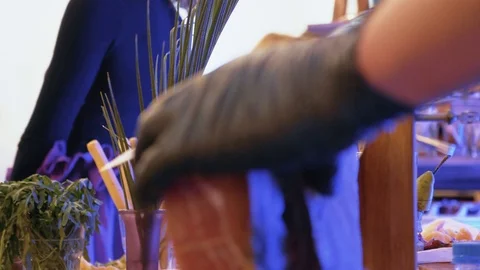 CU hands in black gloves cut parma Video stock 102389818