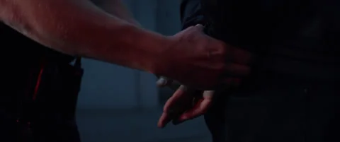 CU on hands, man being handcuffed near unmarked police vehicle in the street Vidéo 140823567
