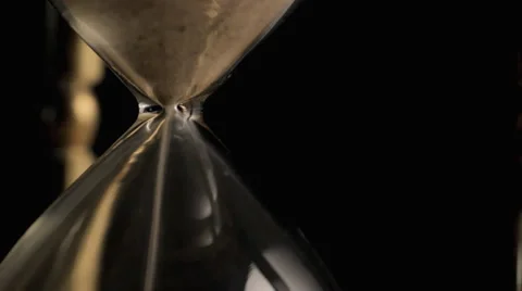 CU hourglass and sand Vidéo 1096212