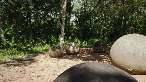 CU jib up cu of Stone sphere to reveal more spheres Video stock 206502075