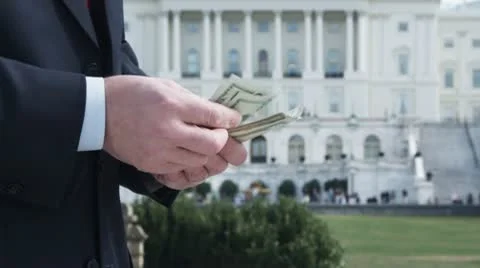 CU, Lockdown of man counting money in front of the US Capitol Building, Stock Footage 10702349