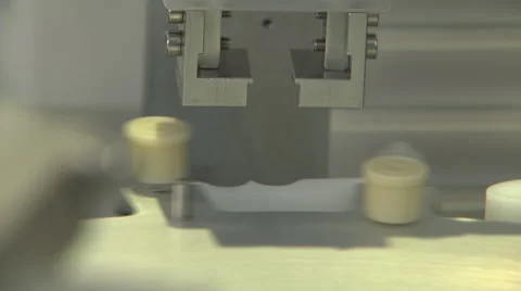 CU machinery caps on Syringes-2 Stock Footage 50626975