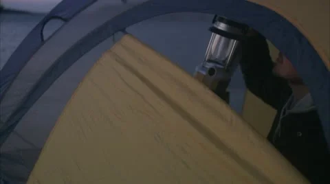 CU Man sitting in dome tent / Stockholm Stock Footage 11339468