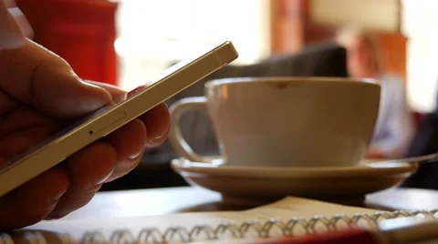 CU man using smartphone in cafe, 4k, UHD Video stock 49427476