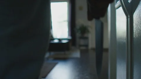 CU of Man Walking with a Large Knife HD Video Stock Footage 92536281