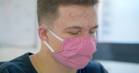 CU Office worker wearing protective face mask Video stock 145210197