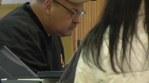 CU of an Ohio  voter casting a  ballot in the presidential election. Stock Footage 68217725