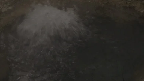 CU Overhead of Bubbling Boiling Hot Spring Yellowstone Stock Footage 122223733