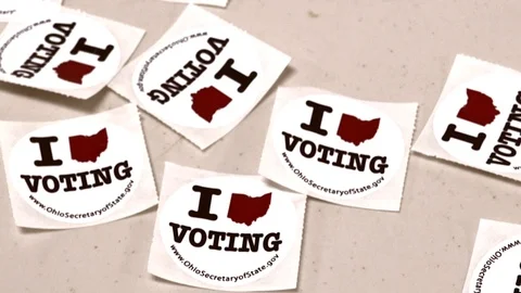 CU pan of I VOTING OHIO stickers Stock Footage 106158888
