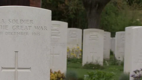 CU Pan Rack Focus Gravestones at Essex Farm Cemetery in Belgium Stock-Footage 97792696