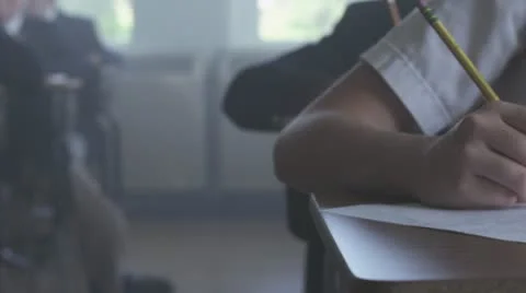 CU, Panning, A class of school children taking notes and then leaving the room Stock Footage 10703586