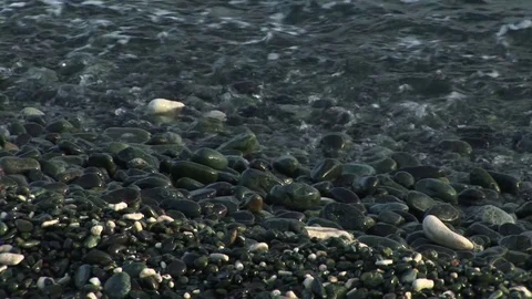 CU pebbles on the beach Stock Footage 72571501