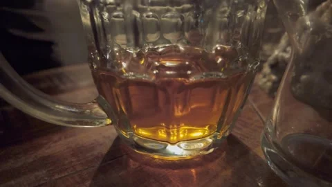 CU pint glass on pub table. Cutaway shot. York.UK 3.9.2026 Stock Footage 346725295