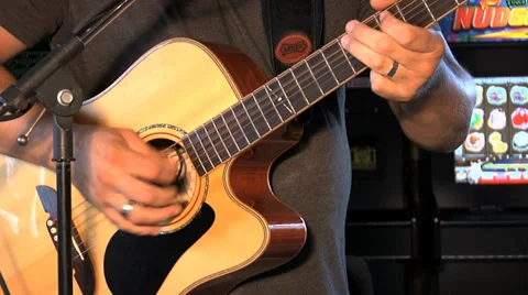 CU playing acoustic guitar Видео 37013878