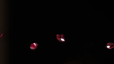 CU Red Ruby Diamonds fall in slow motion 4K 7 Stock Footage 253123984