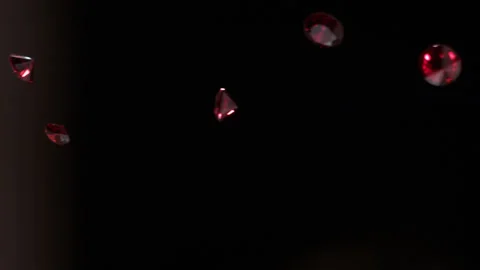 CU Red Ruby Diamonds fall in slow motion 4K 4 Stock Footage 253126886