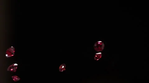 CU Red Ruby Diamonds fall in slow motion 4K 6 Stock Footage 253157632