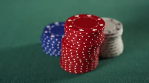 CU of red, white and blue stacked chips Stock Footage 53243080