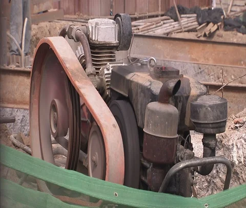 CU running motor with belt on construction site. Stock Footage 86743792