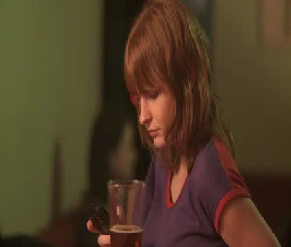 CU, Selective Focus, A woman sitting at a bar using a mobile phone when a man Video stock 10701810