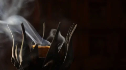 CU Smoke from burning incense in metal holder Video stock 69937430