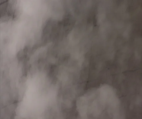 CU steam billowing from around cooling tower with hissing sound Stock Footage 86744641