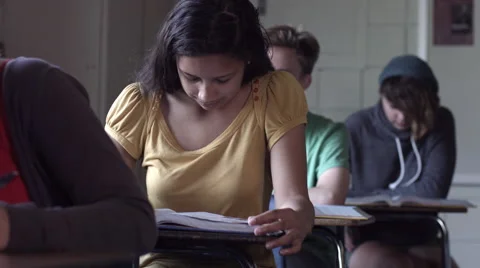 CU Student studies then looks up and smiles 4K Stock Footage 41188007