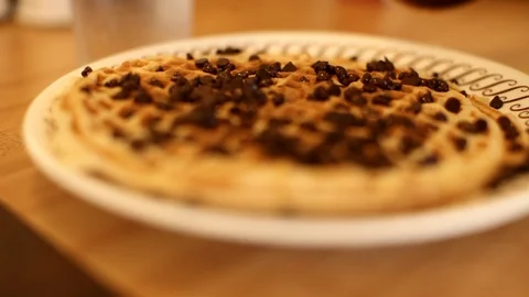 CU of Syrup Being Poured on Chocolate Chip Waffles HD Video Video stock 92914009