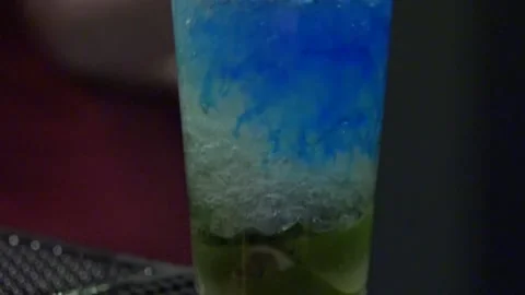 CU Tilt Up Blue Cocktail Video stock 142670422