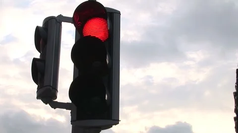CU Traffic Light Switches From Red To Green Stock-Footage 1180549