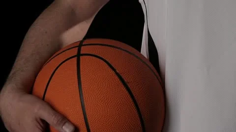 CU, TU, Basketball player with cut and nosebleed holding a basketball Stock Footage 10703069