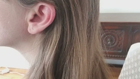 CU of Vigorous Scratching of Ear and Scalp Stock Footage 87029030