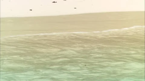 CU waves on shore Stock Footage 22667526