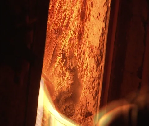 CU wrench inserted into red hot coal furnace inside Shenhua Sanhe power station Stock Footage 86746573