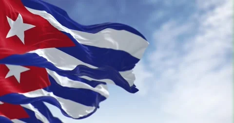 Cuba national flags waving in the wind on a clear day Stock Footage 285513953