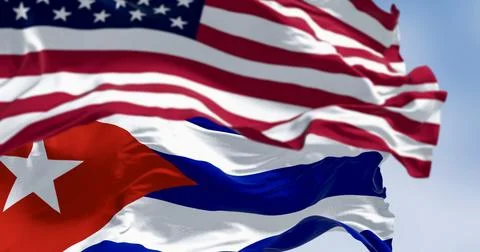Cuba national flags waving in the wind on a clear day Stock Illustration