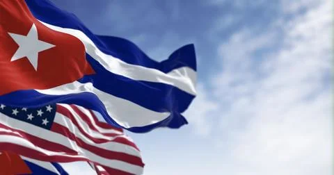 Cuba national flags waving in the wind on a clear day Stock Illustration