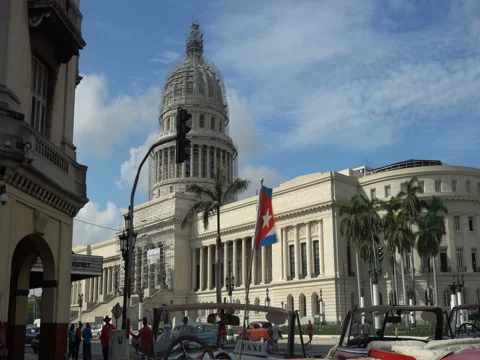 Cuban flag is fluttering on a background of the Capitol in Havana Video stock 71215115