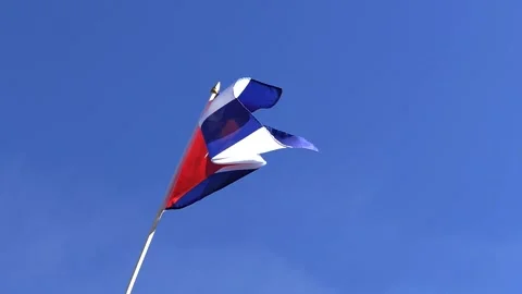 The Cuban flag waving in the wind in the blue sky Stock Footage 282432793