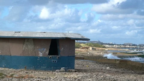 Cuban forts on shore break Stock Footage 111581380