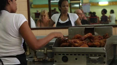Cuban Restaurant Workers Prepare Plates of Fried Chicken Stock Footage 141158500