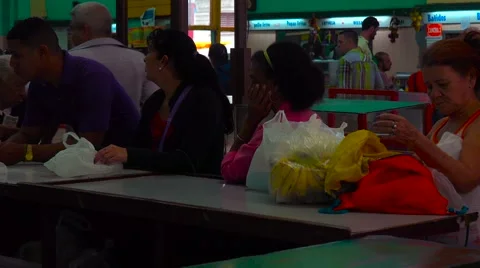 Cubans wait in lines for basic government services and products in Havana, Cuba. Video stock 66764985