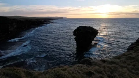 Cubby roo sea stack in Orkney at sundown in 4k Video stock 301191166