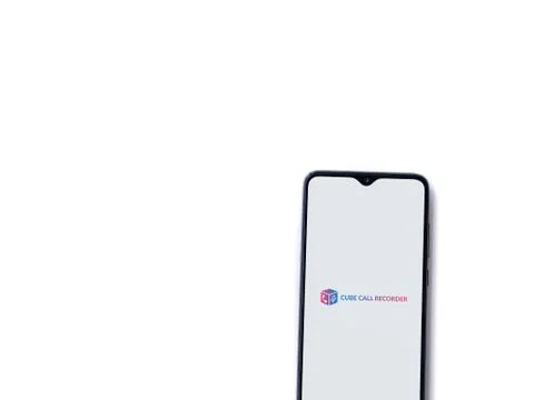 Cube ACR app launch screen with logo on the display of a black mobile smartph Foto stock