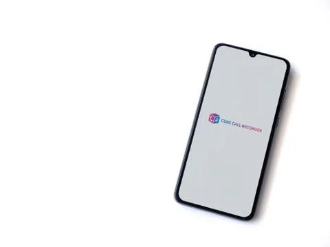 Cube ACR app launch screen with logo on the display of a black mobile smartph Stock Photos