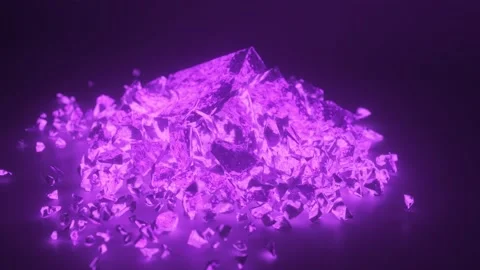 A cube of bright glowing stone shatters into thousands of small pieces in slow Stock Footage 142089070